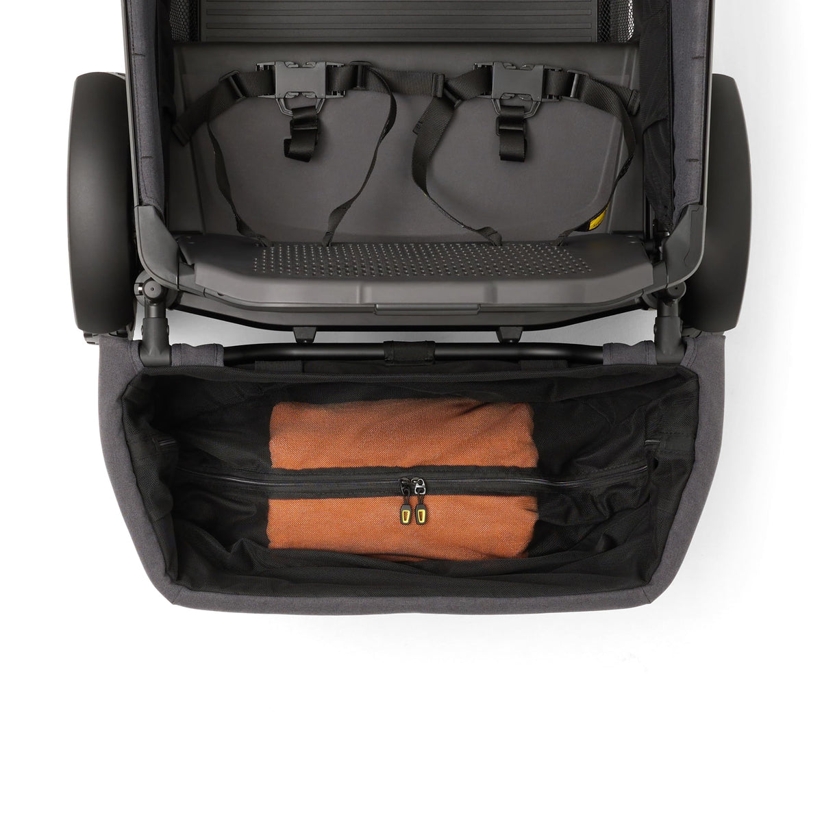 Veer rear basket in lifestyle park scene illustrating convenience on outings
