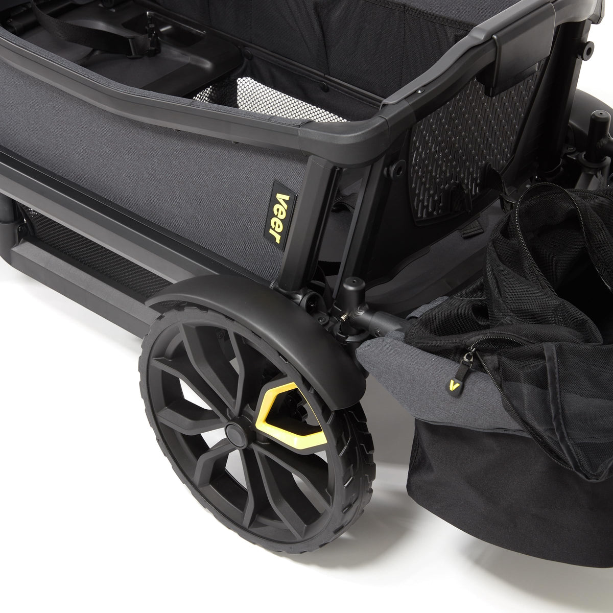 Veer rear basket holding Napper and Drink Snack Tray for organized travel