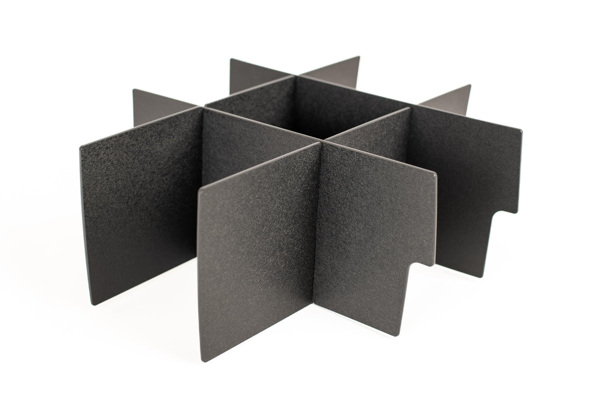 Vehicle OCD front view of console organizer showing fitted compartments and tidy storage