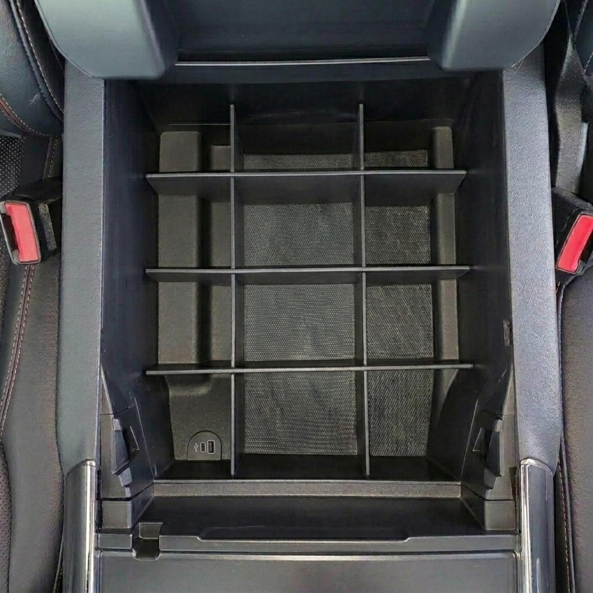 Vehicle OCD organizer installed in Ford F-150 console for quick item access