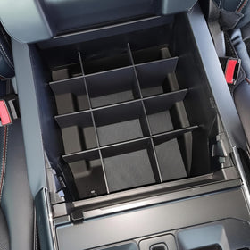Vehicle OCD organizer next to ruler showing dimensions for confident fitment