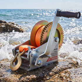 VEVOR winch beside a ruler scale comparison showing compact portable size
