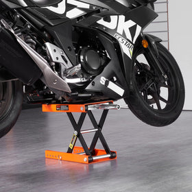 VEVOR lift next to motorcycle for scale showing size and clearance benefit