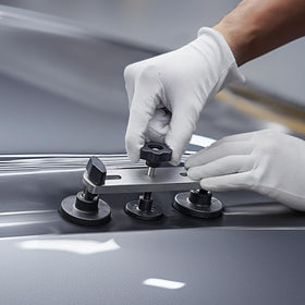 VEVOR kit in use on car door showing paintless dent repair benefit
