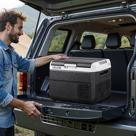 VEVOR beside a carry-on suitcase for scale demonstrating compact size and transportability benefit