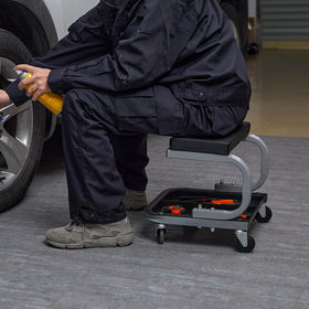 VEVOR seat being wiped clean to show oilproof, quick-clean maintenance benefit