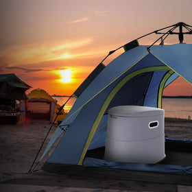 VEVOR toilet placed at campsite demonstrating privacy and portable sanitation benefit