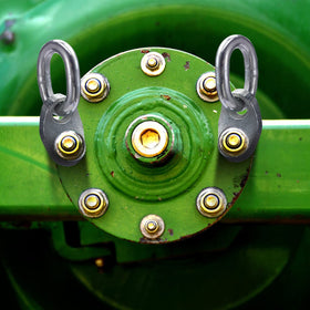 VEXPLO lifting brackets attached to cherry picker while lifting engine, enhancing safety