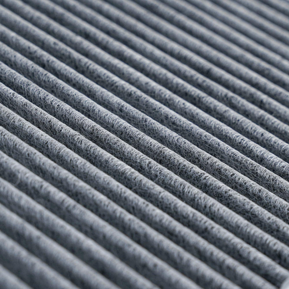 VION close-up of activated carbon layer showing enhanced odor adsorption benefit