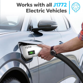VIPTOO adapter connected to Tesla in driveway demonstrating convenient home charging