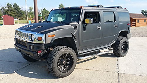 VViViD installer squeegeeing air release channels for bubble-free finish