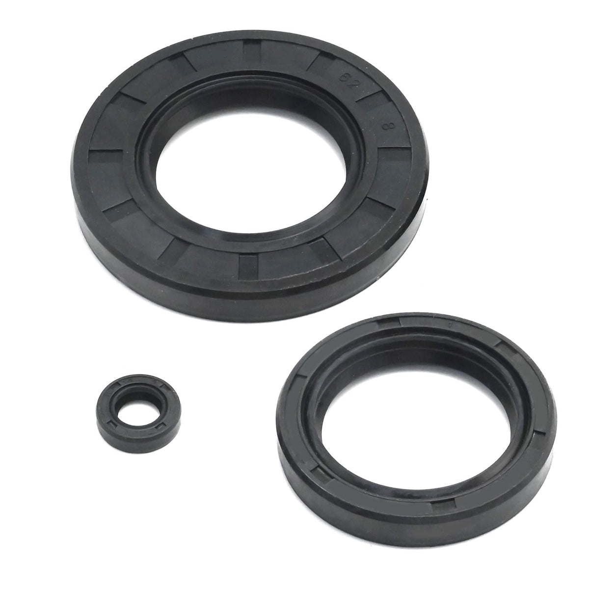 Vkinman oil seals and small parts laid out to simplify reassembly