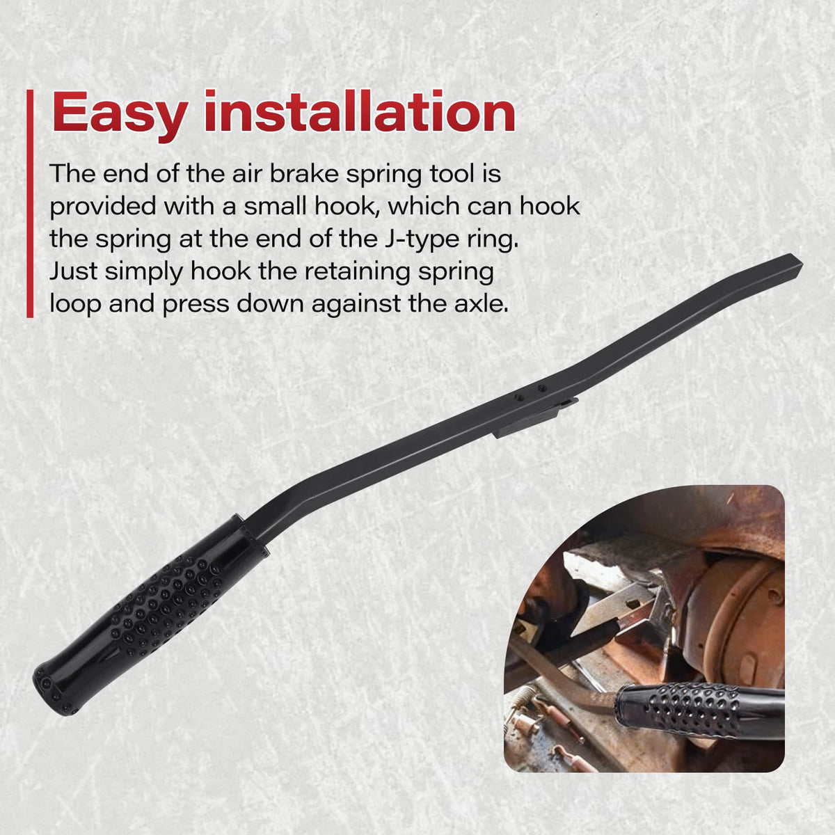 VKVXCLON mechanic using tool on axle demonstrating safer single-person installation