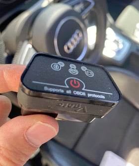 vLinker iCar2 used in garage environment showing DIY troubleshooting benefit