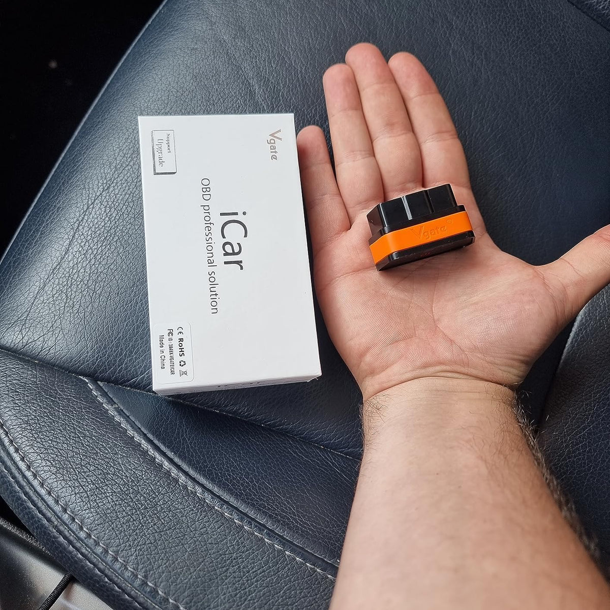 vLinker iCar2 used roadside with car hood open showing on-the-go diagnostics confidence