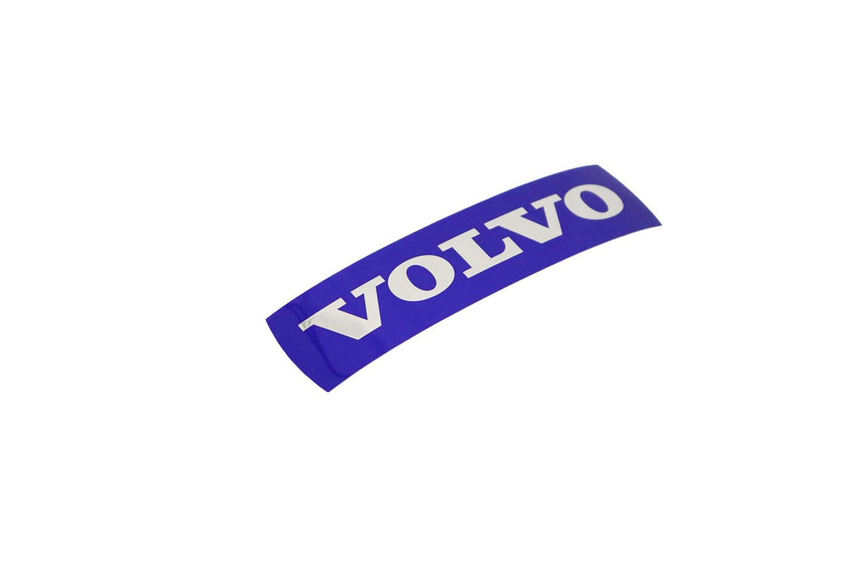 Close-up of Volvo badge texture and finish demonstrating durable exterior surface