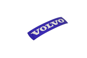 Close-up of Volvo badge texture and finish demonstrating durable exterior surface