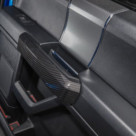 Voodonala interior lifestyle shot in F150, cohesive sporty cabin benefit