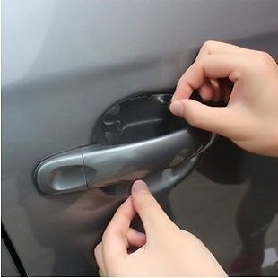 VViViD film being trimmed with tools showing easy installation benefit
