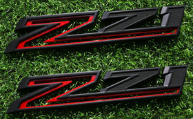 Vxntpart front view of Z71 emblem showing bold black and red finish and improved styling