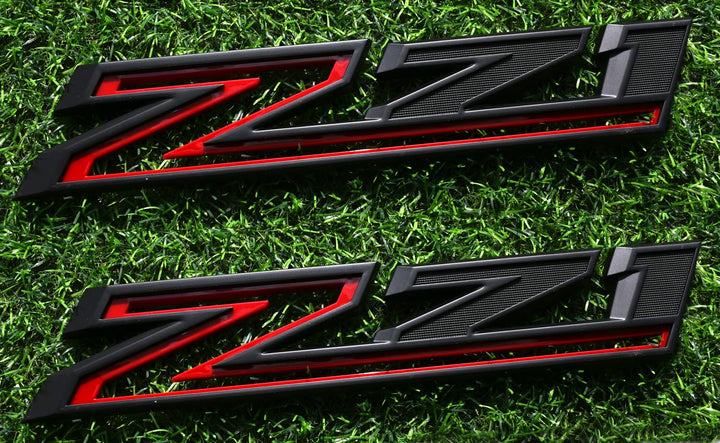 Vxntpart front view of Z71 emblem showing bold black and red finish and improved styling