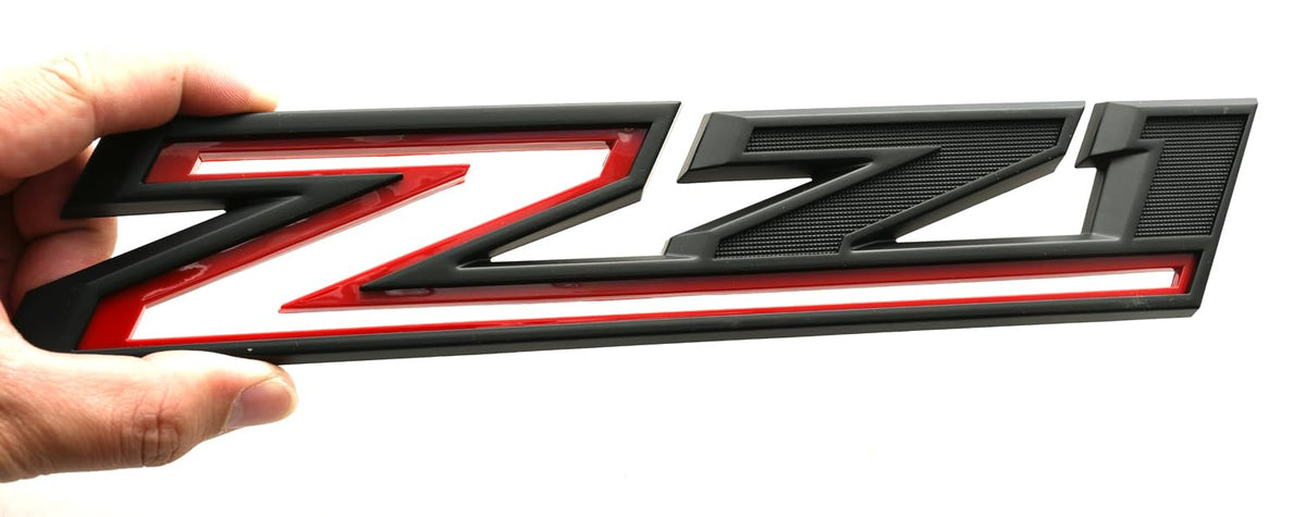 Vxntpart package contents with two emblems ready for passenger and driver side replacement