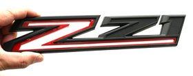 Vxntpart package contents with two emblems ready for passenger and driver side replacement