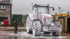 W close-up of thick foam lather demonstrating lift and soil suspension benefit