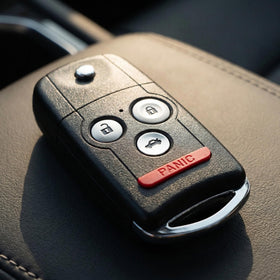 WADMHYACE remote placed on Acura dashboard demonstrating seamless fit