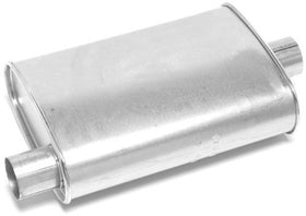 Walker muffler next to ruler showing scale to confirm sizing before purchase