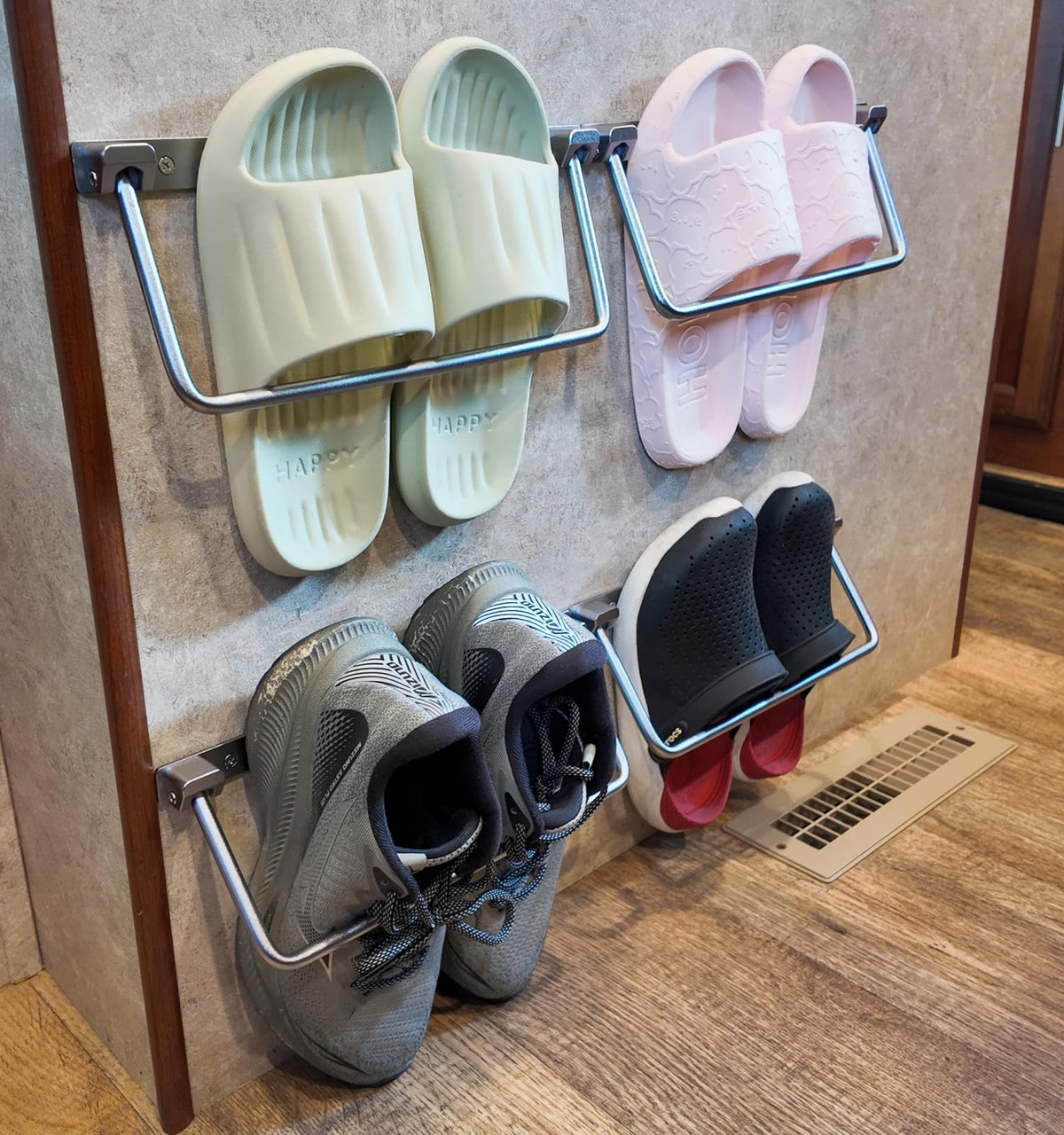 WanDwel front view wall mounted shoe rack showing organized pairs and neat entryway