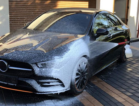 W foam cannon application on SUV creating thick foam to loosen dirt quickly
