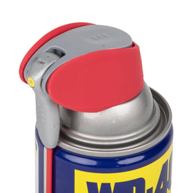 WD-40 spraying a precision stream to loosen a rusted bolt for fast repair