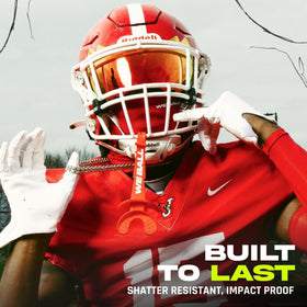 We Ball Sports visor next to ruler showing scale and universal helmet fit benefit