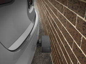WeatherTech BumpStep next to ruler for scale comparison showing compact 12-inch width