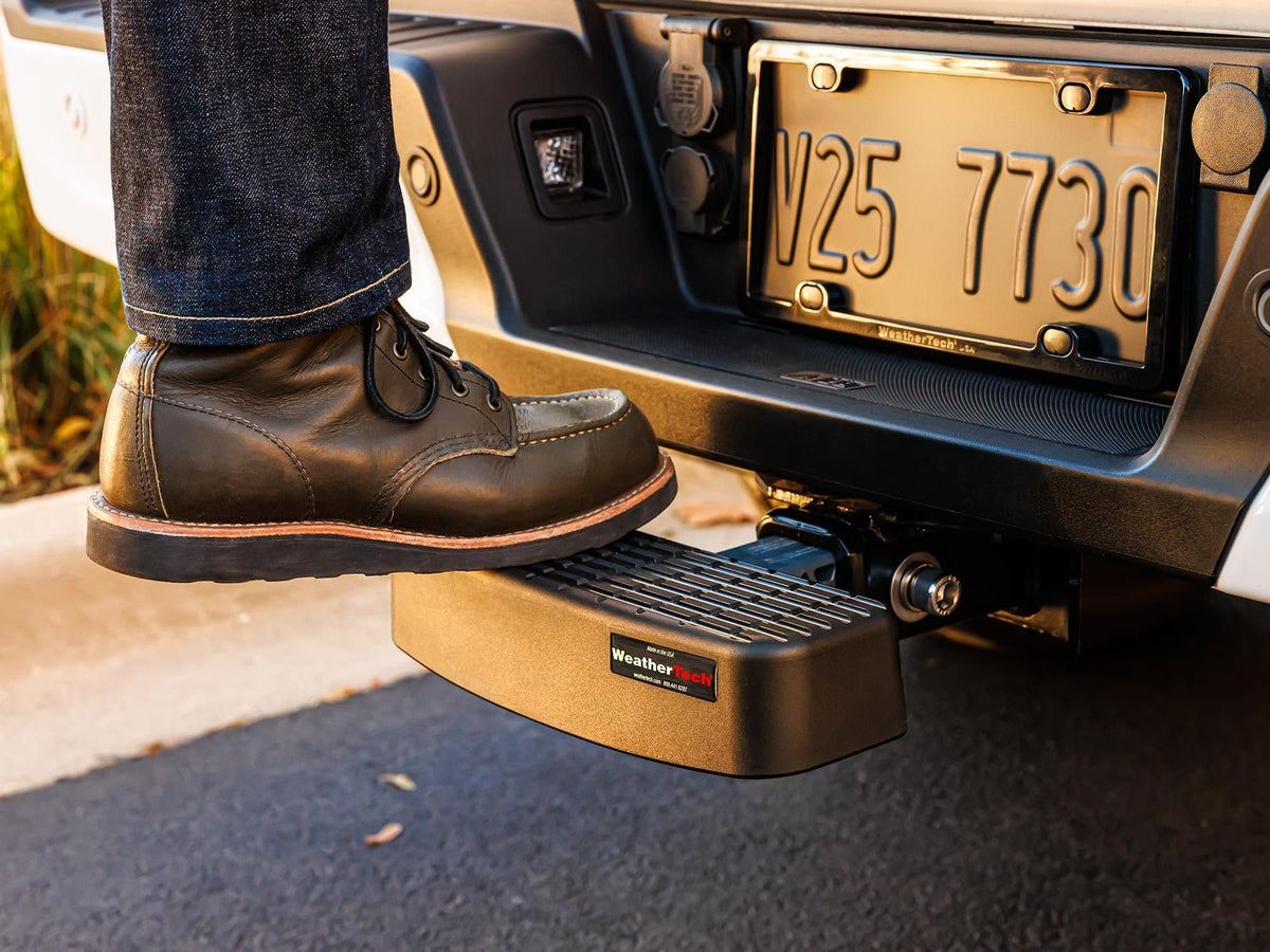 WeatherTech BumpStep side profile installed on SUV demonstrating low-profile step and clearance