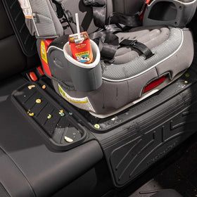WeatherTech protector being wiped clean with cloth showing easy maintenance benefit