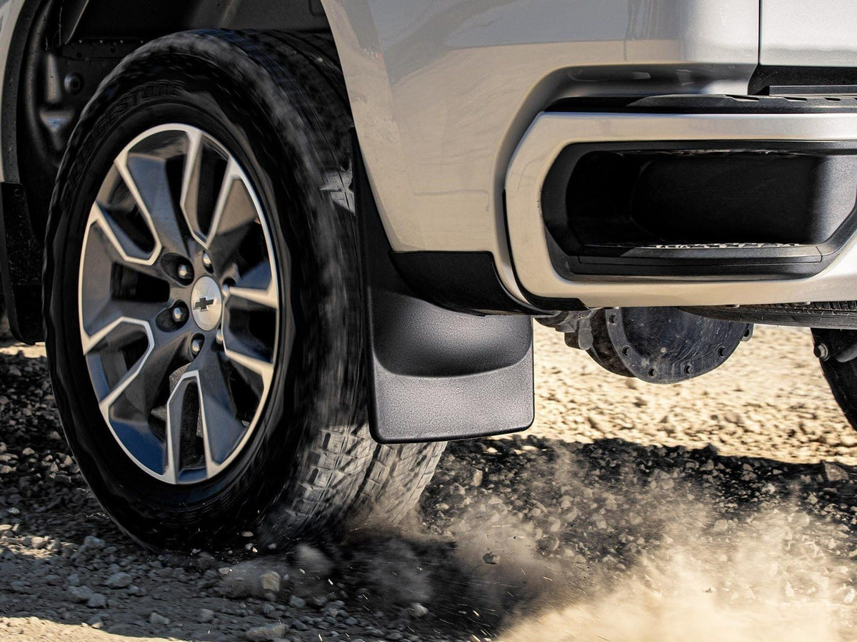 WeatherTech rear mud flap on RAM 3500 showing coverage and debris deflection