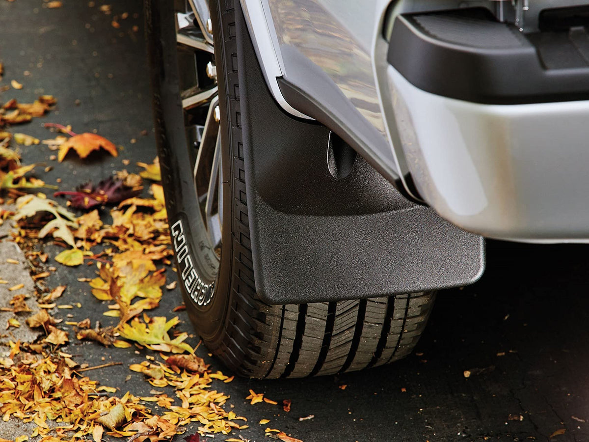 WeatherTech mudflap deflecting stones and water to reduce paint damage