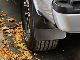 WeatherTech mudflap deflecting stones and water to reduce paint damage