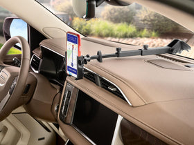 WeatherTech telescopic arm extended to show reach for deep dashboards and flexible positioning