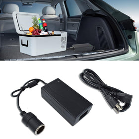 Weishuo adapter held in hand for scale showing compact portable size and travel-friendly design