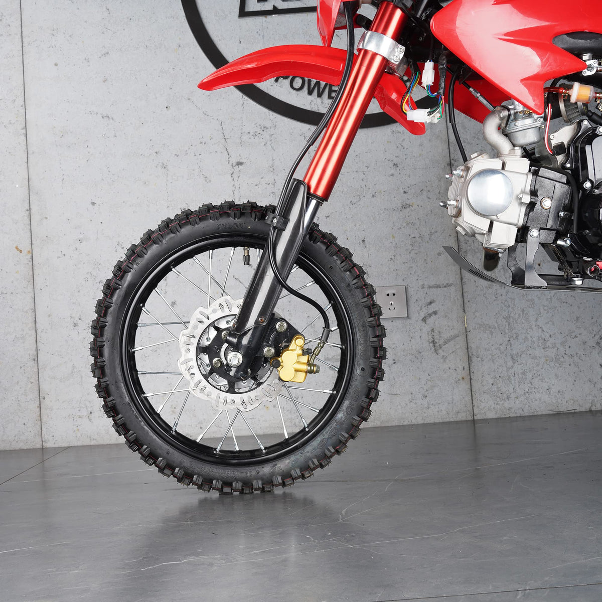WEIYINGSI lifestyle installed on a pit bike front wheel to demonstrate fit and on-trail control