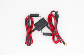 Werks Gruppe ChargeSafe next to ruler showing compact size for easy storage