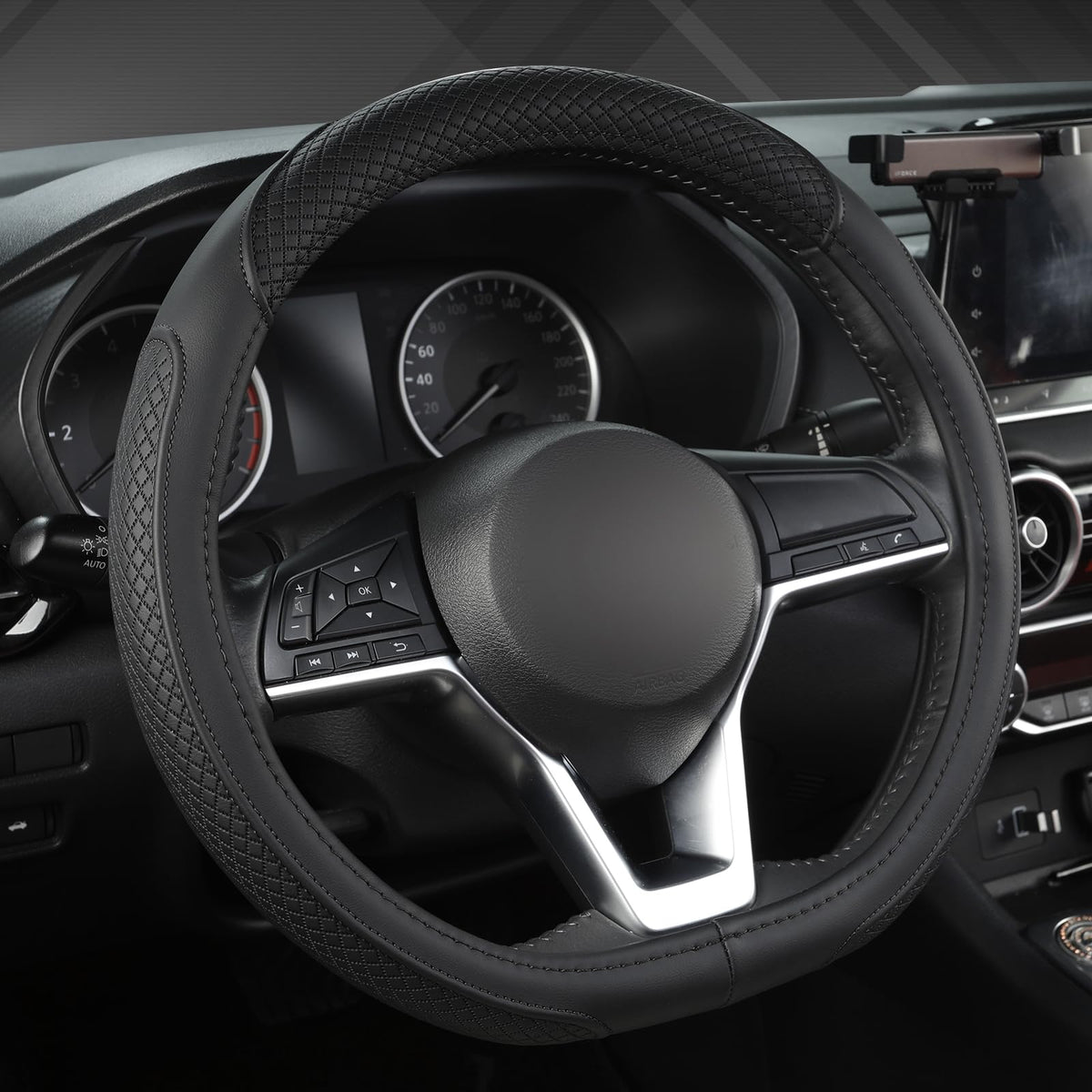 West Llama front view of D-shaped black steering wheel cover for Nissan, sleek protection