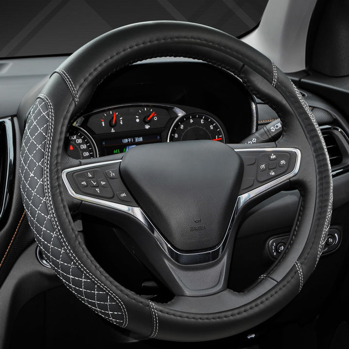 West Llama front packaging showing the steering wheel cover and benefit of tailored fit