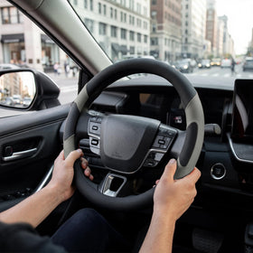 West Llama cover installed on Toyota Camry steering wheel delivering improved grip