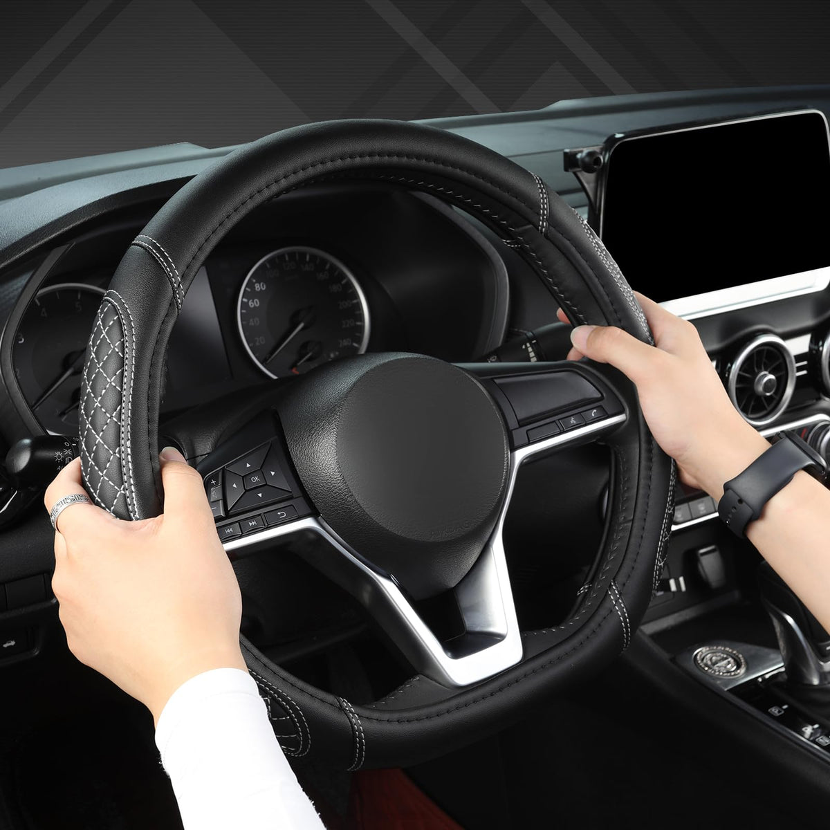 West Llama lifestyle shot in car interior highlighting upgraded steering feel