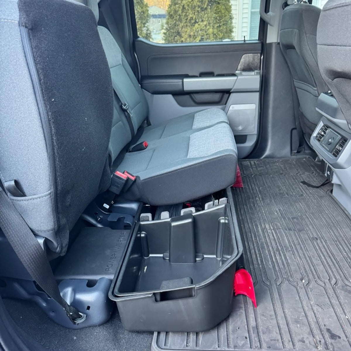 WHALEMOTOR lifestyle shot with camping gear showing versatile storage benefit