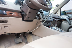 Wingbrake clamp detail showing fit on brake pedal support for secure attachment